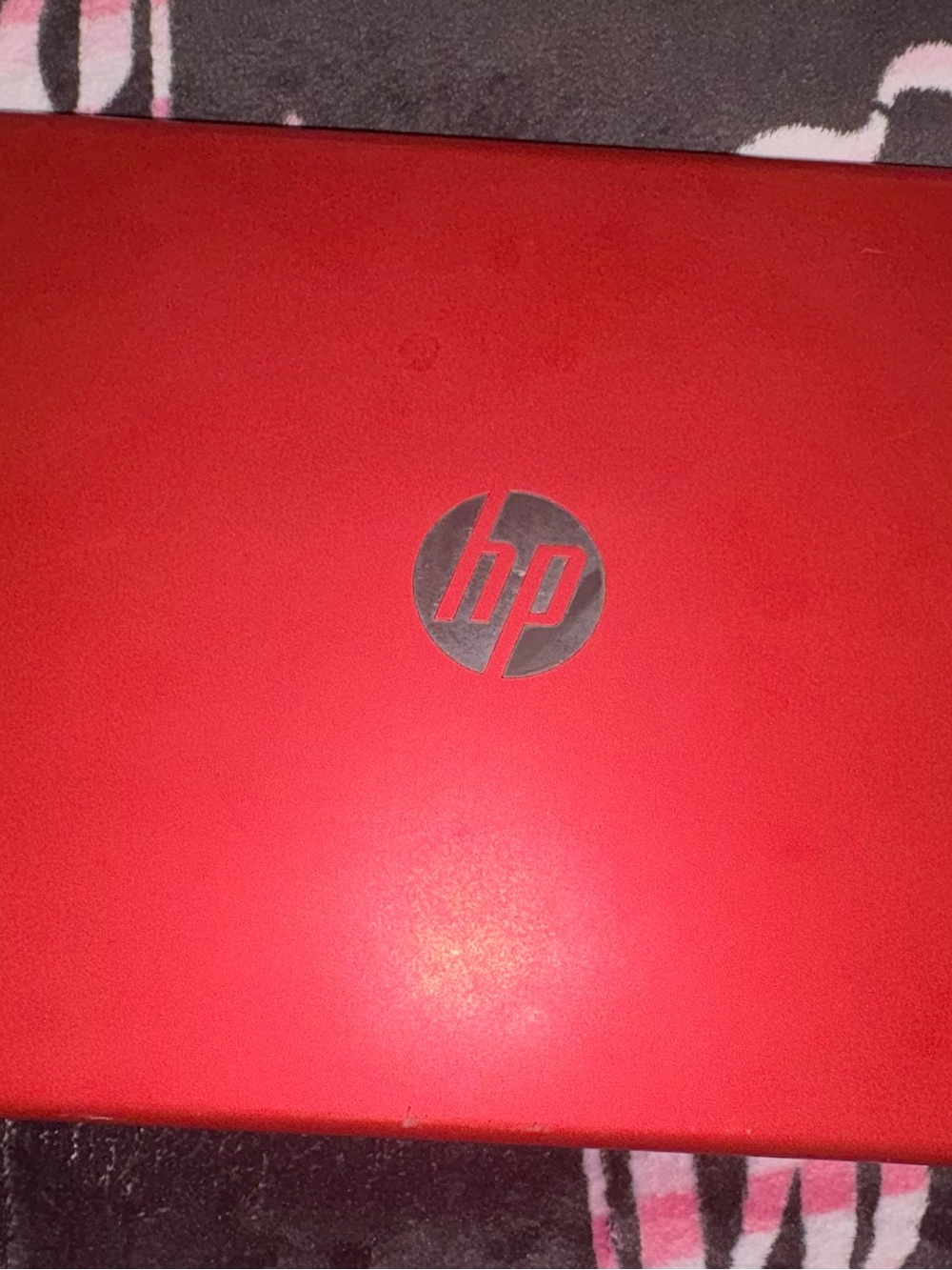 HP Red Laptop with Silver HP Logo